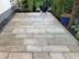 Terrassenplatte Granit Girona Antique auf Terrasse