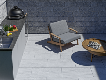 Terrasse avec dallage effet quartzite Monro Light 3 cm avec coin détente et cuisine extérieure