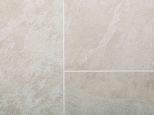 Ce carrelage peut être posé avec des joints fins. Grès cérame en effet ardoise beige Alpin par le haut