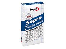 Un sac de mortier-colle flexible blanc